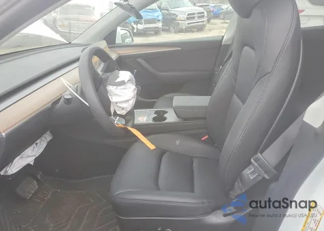 2023 Tesla Model Y from USA, damaged, VIN 7SAYGDEE8PF715536